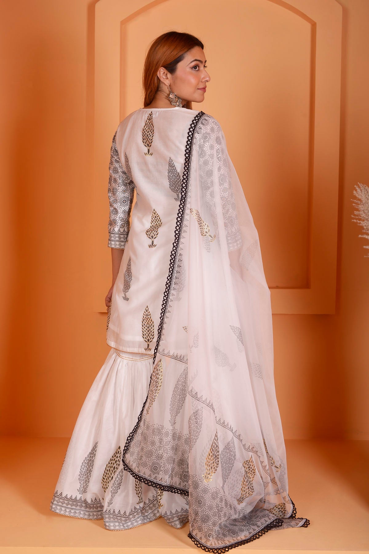 Rimjhim Ivory With Black Lace Work And Foil Block Print Short Kurta With Garara And Dupatta